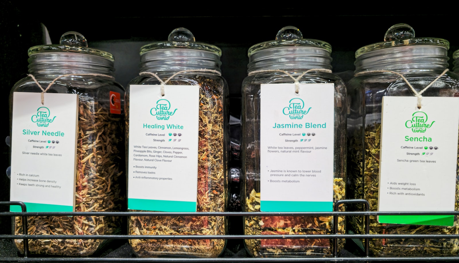 Glass jars filled with dried herbs and spices